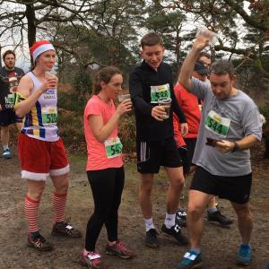Runners (and drinkers) take part in the Boxing Day Run